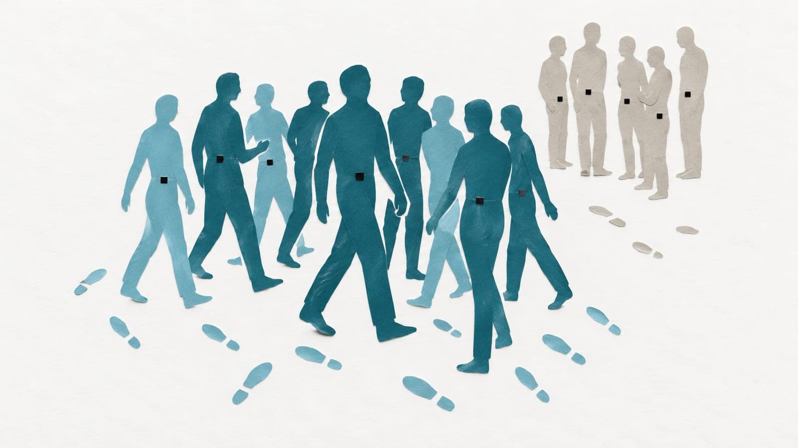 People wearing movement sensors walk among many blue-green footprints, while a smaller grey group stands beside fewer footprints.