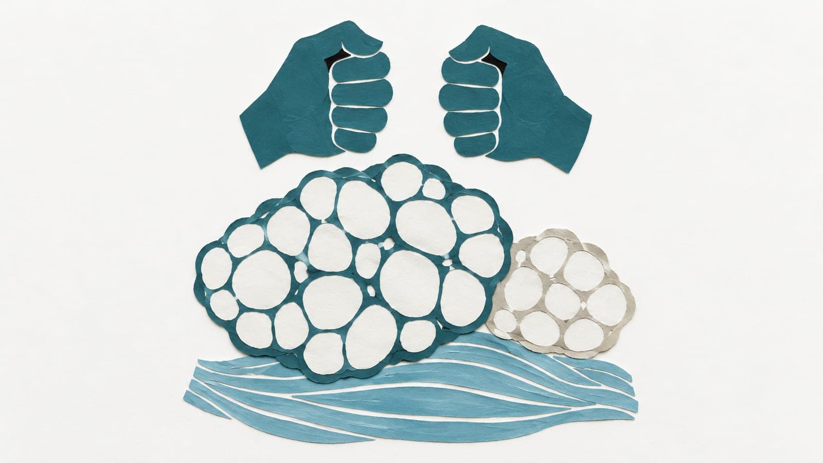 Fat tissue forms a large dark blue-green cluster beside a smaller grey cluster, resting on muscle fibres beneath similarly clenched hands.